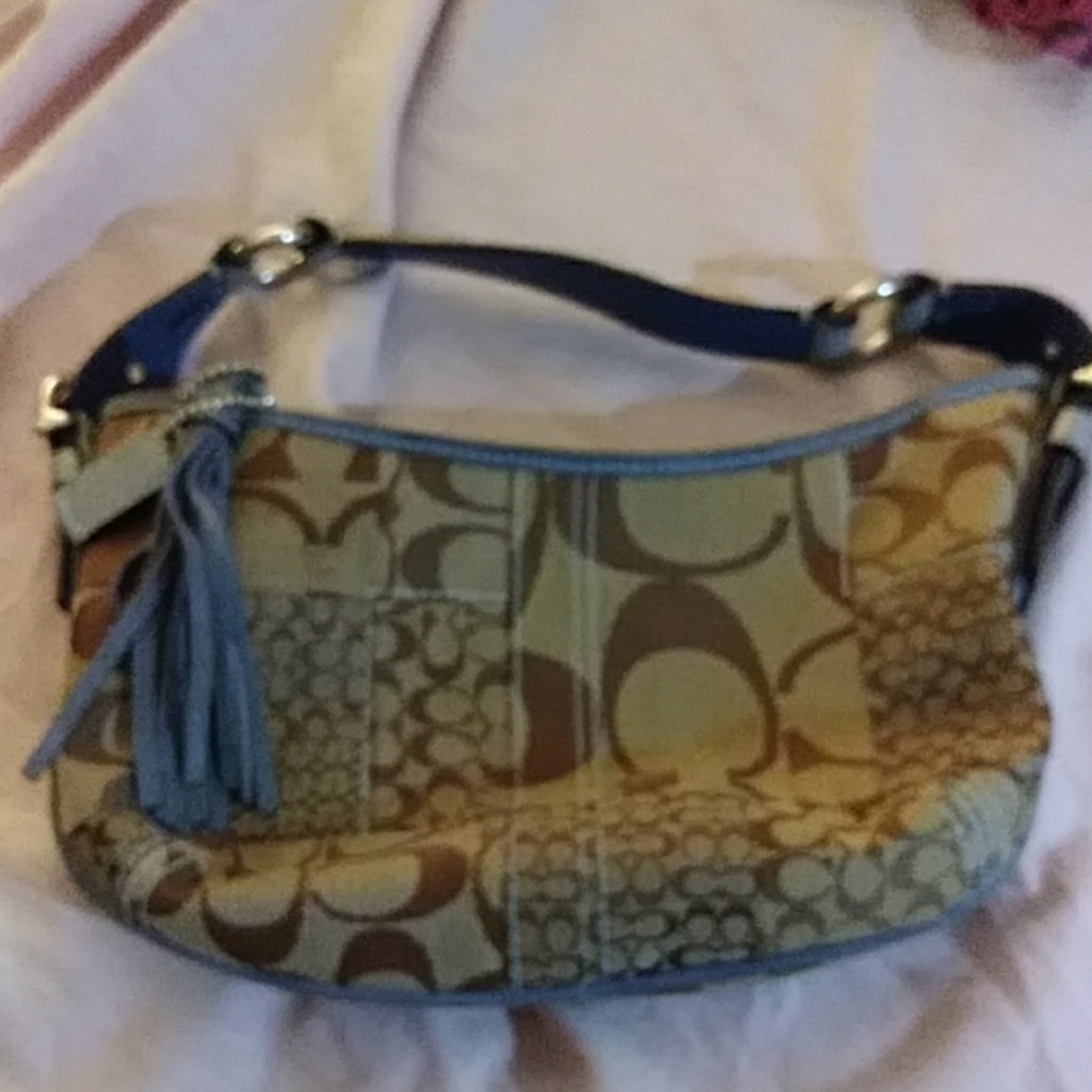 Coach authentic small gray purse with cute tassle